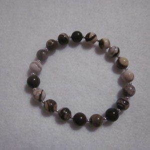 Brown and Cream Swirl Beaded Stretch Bracelet.